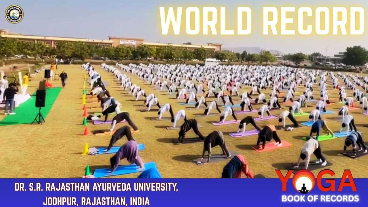 287 Students Perform Parvatasana – Mass Yoga World Record